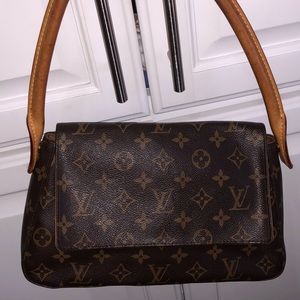 Louis Vuitton mini loop shoulder purse.